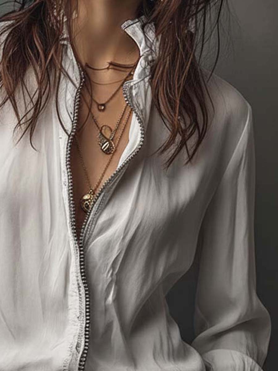 Blair - Blusa blanca con cremallera y mangas con volante