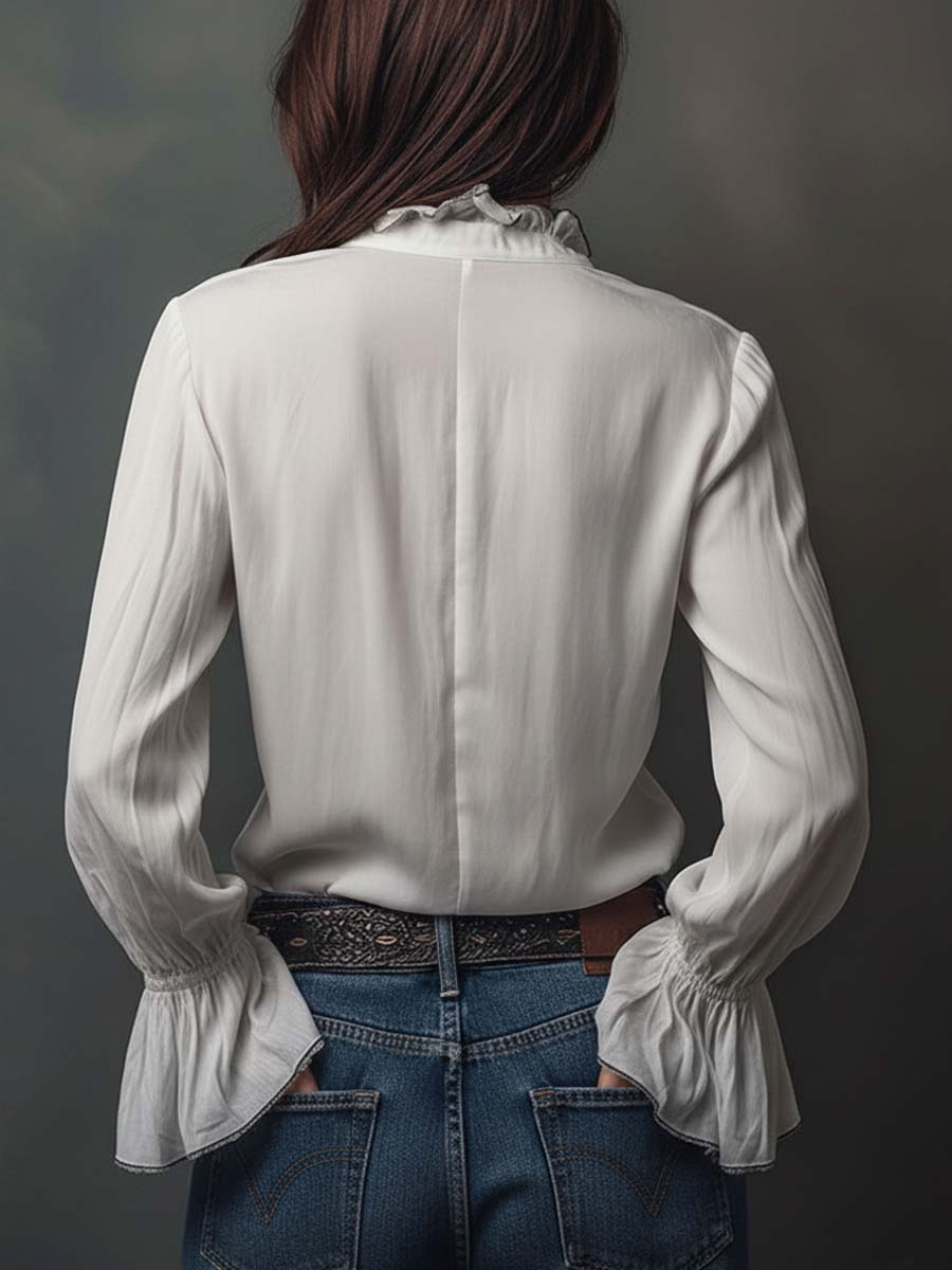Blair - Blusa blanca con cremallera y mangas con volante