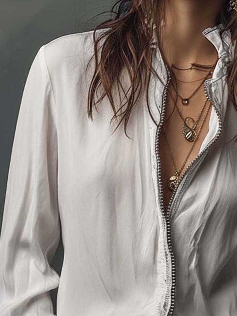 Blair - Blusa blanca con cremallera y mangas con volante
